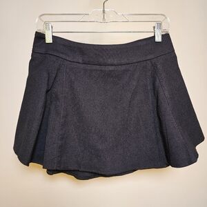 NWT Brandy Melville John Galt black mini skirt size 28.